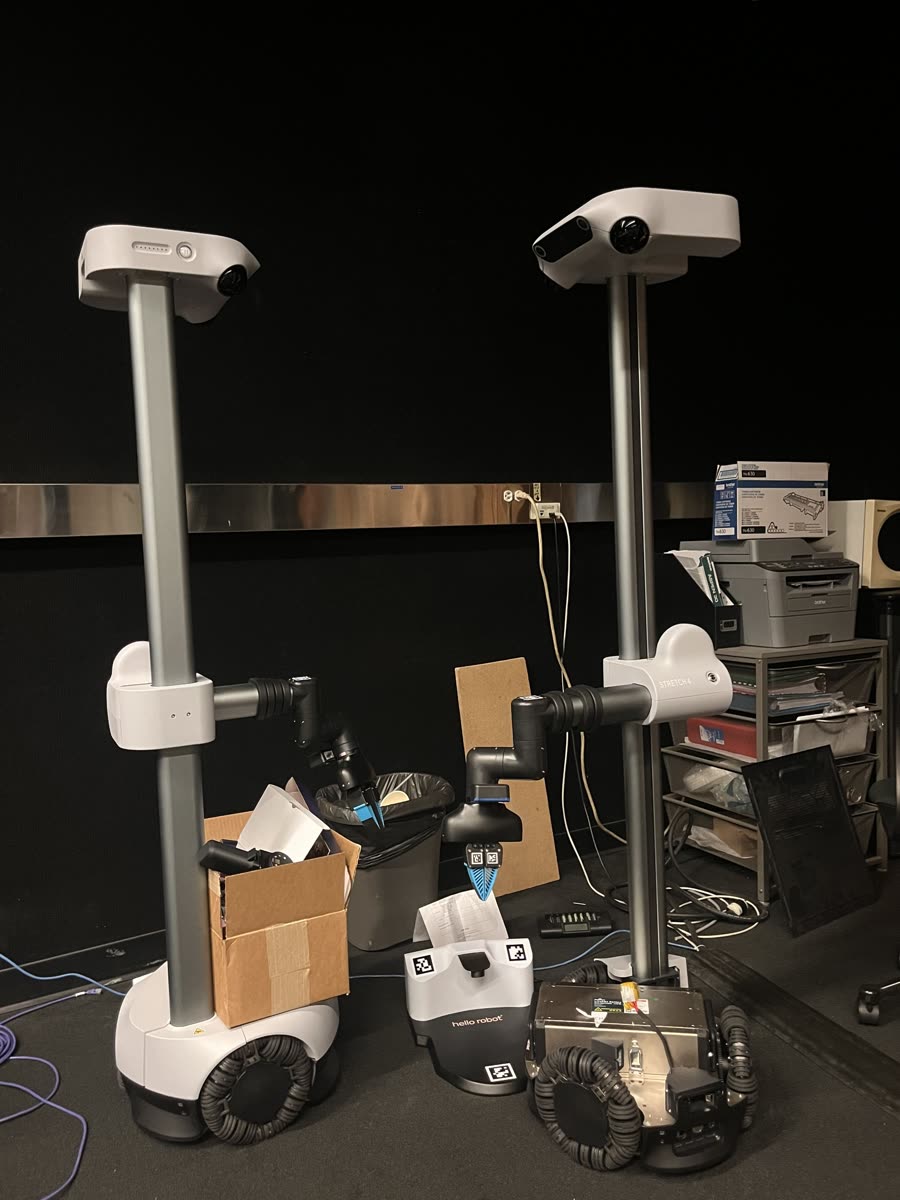 Two Hello Robot Stretch mobile manipulators in the lab