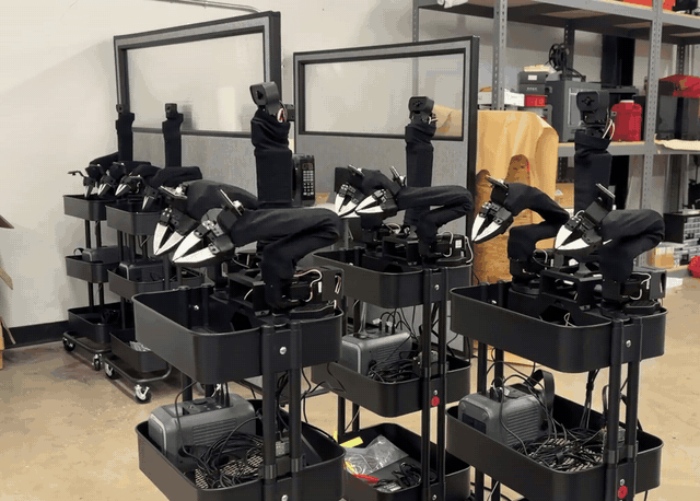 Robot arms from Daniel Brown's ARIA Lab dancing in sync